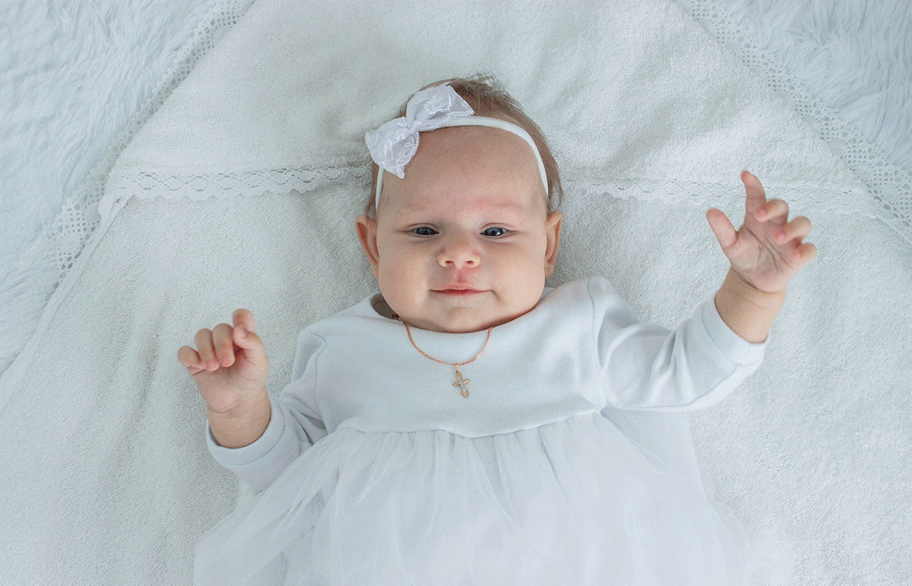 Robe baptême fille : le guide ultime pour un moment inoubliable