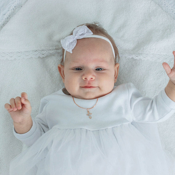 Robe baptême fille : le guide ultime pour un moment inoubliable