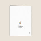 Croix et couronne de fleurs