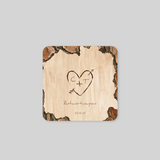 Herz in Holz eingraviert