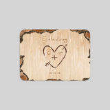 Herz in Holz eingraviert