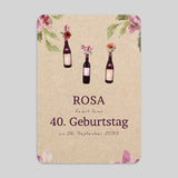 Flaschen Wein und Blumen