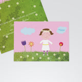 Mädchen auf Blumenwiese
